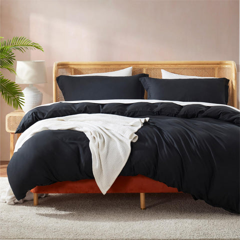 Nestl black duvet cover front view showing clean hotel-style finish and elegance