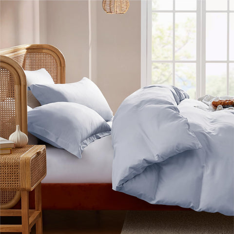 Nestl duvet on queen bed showing true-to-size 90x90 inch fit