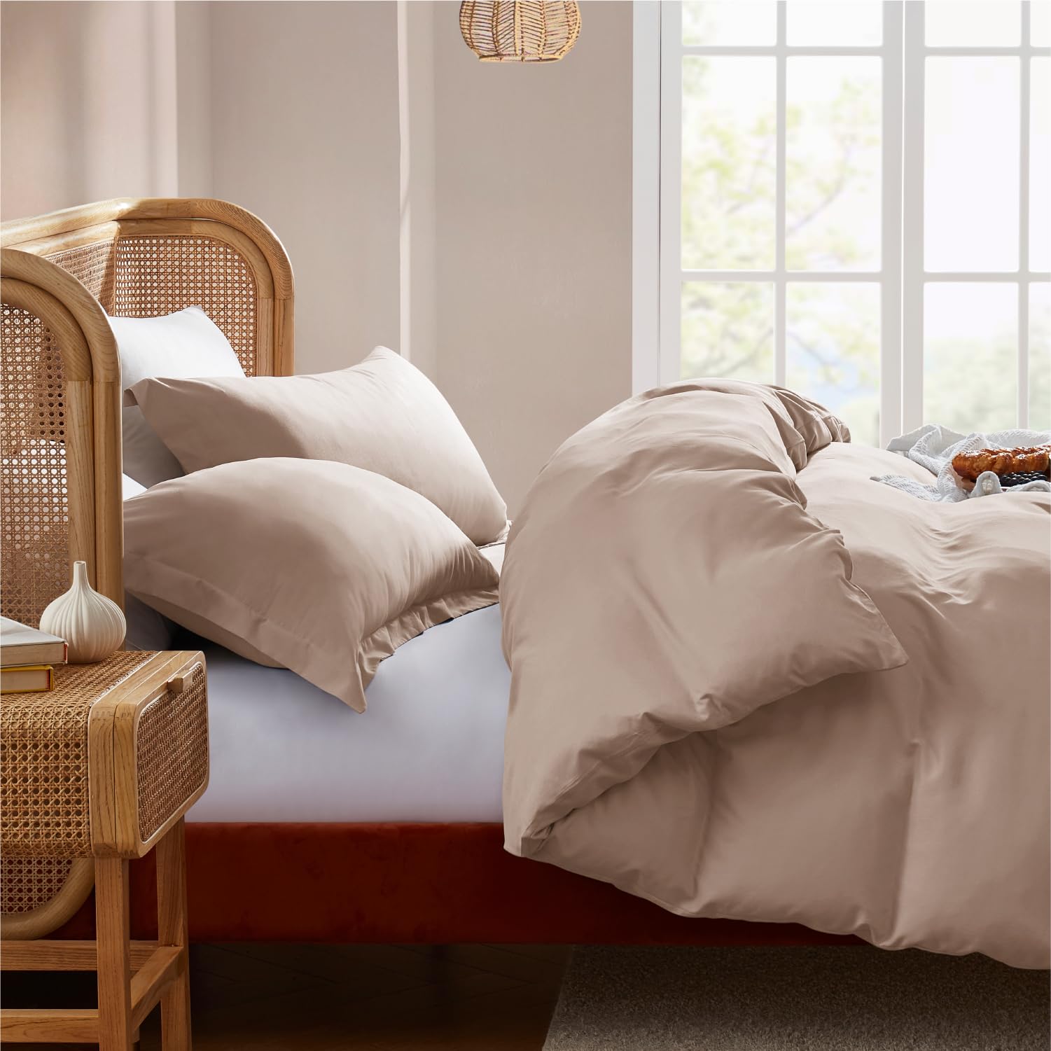Nestl khaki on queen bed showing true-to-size fit and drape