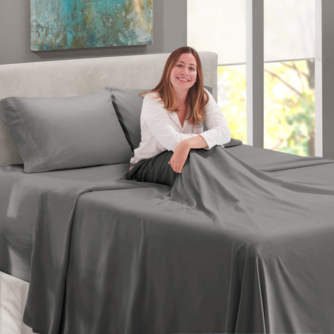 Nestl fitted sheet on deep mattress with topper illustrating true 21-inch pocket fit