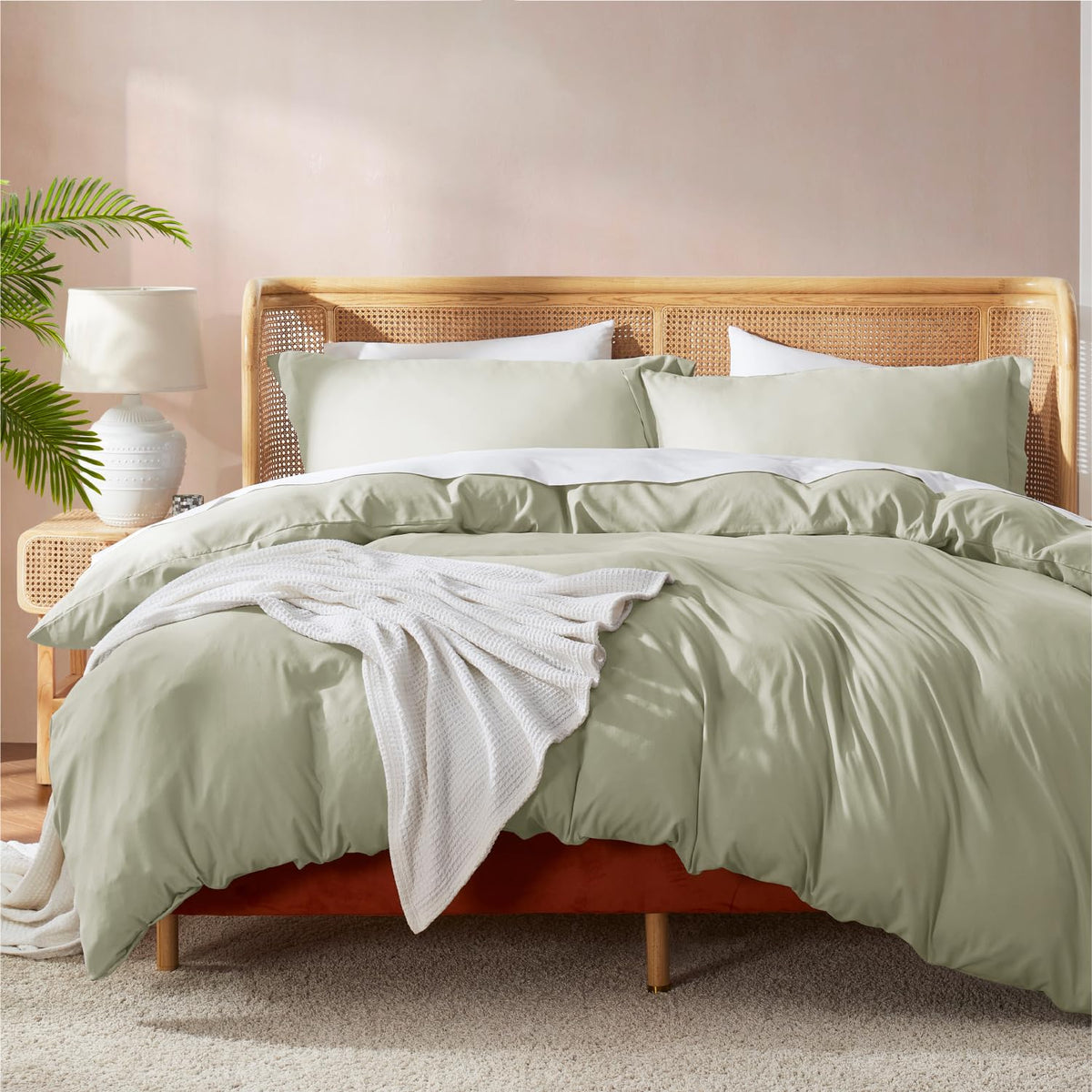 Nestl light sage duvet cover front packaging showing calm color and set contents
