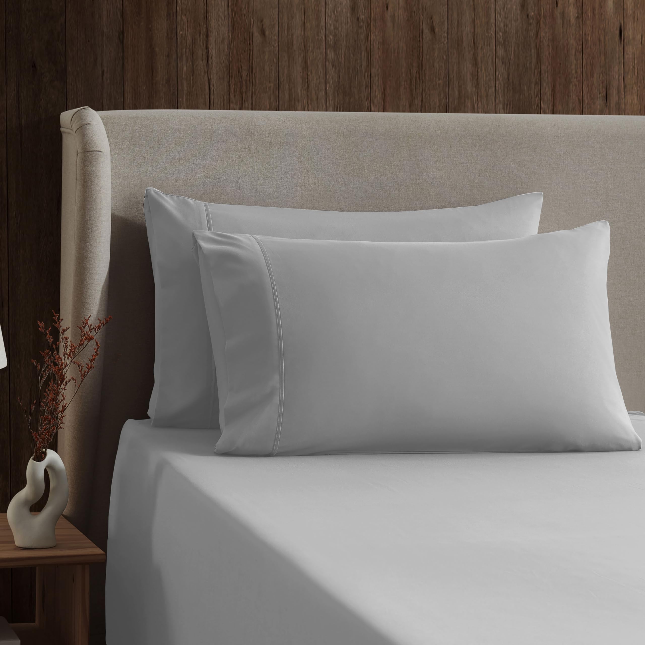 Nestl pillowcases folded to display smooth seams and consistent microfiber feel