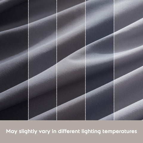 Nestl fitted sheet next to ruler showing 18–24 inch depth compatibility