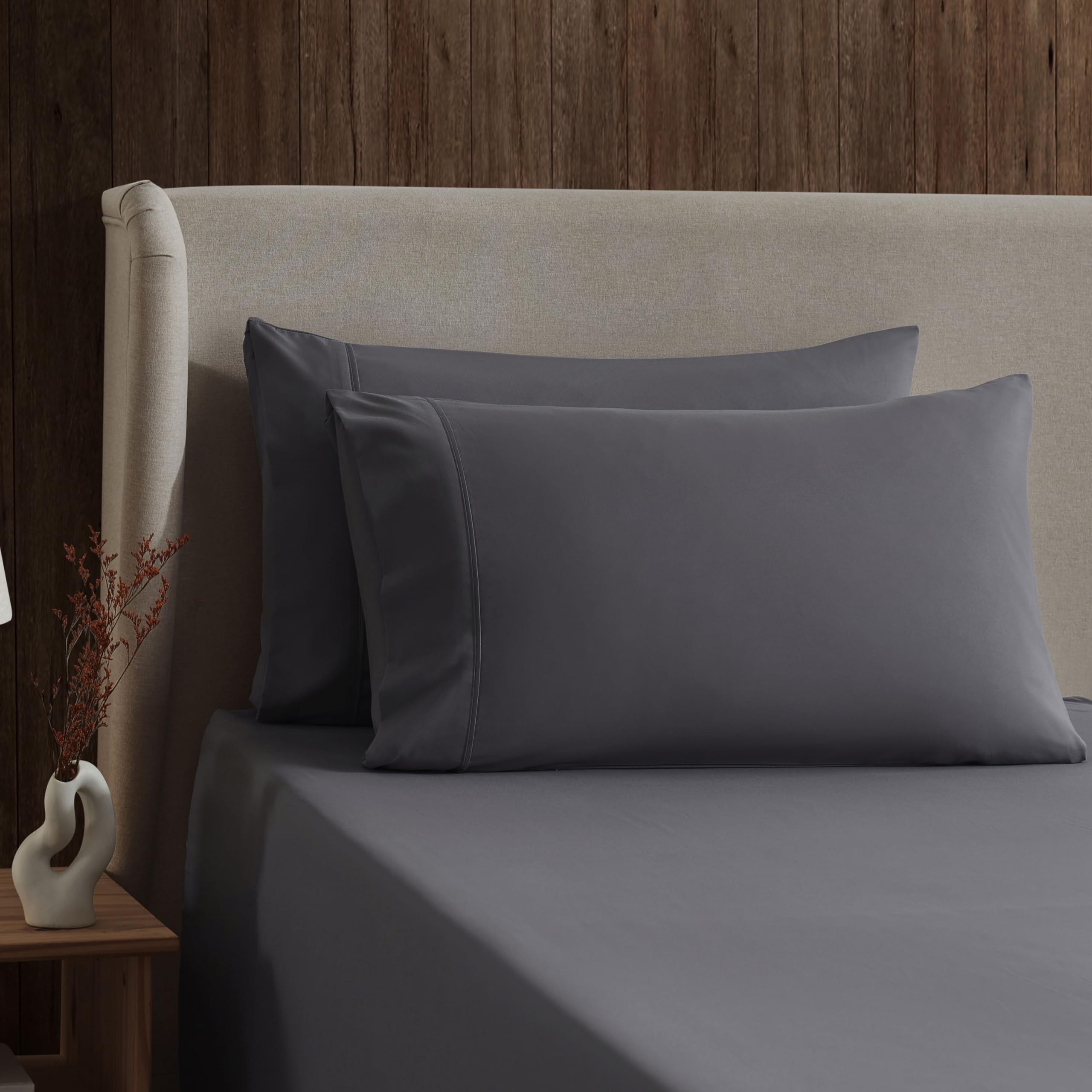 Nestl folded flat sheet detail showing neat edges and dark grey tone