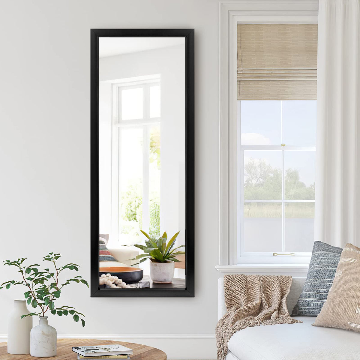 NeuType front view of 43x16 mirror showing sleek black frame and full-length reflection benefit
