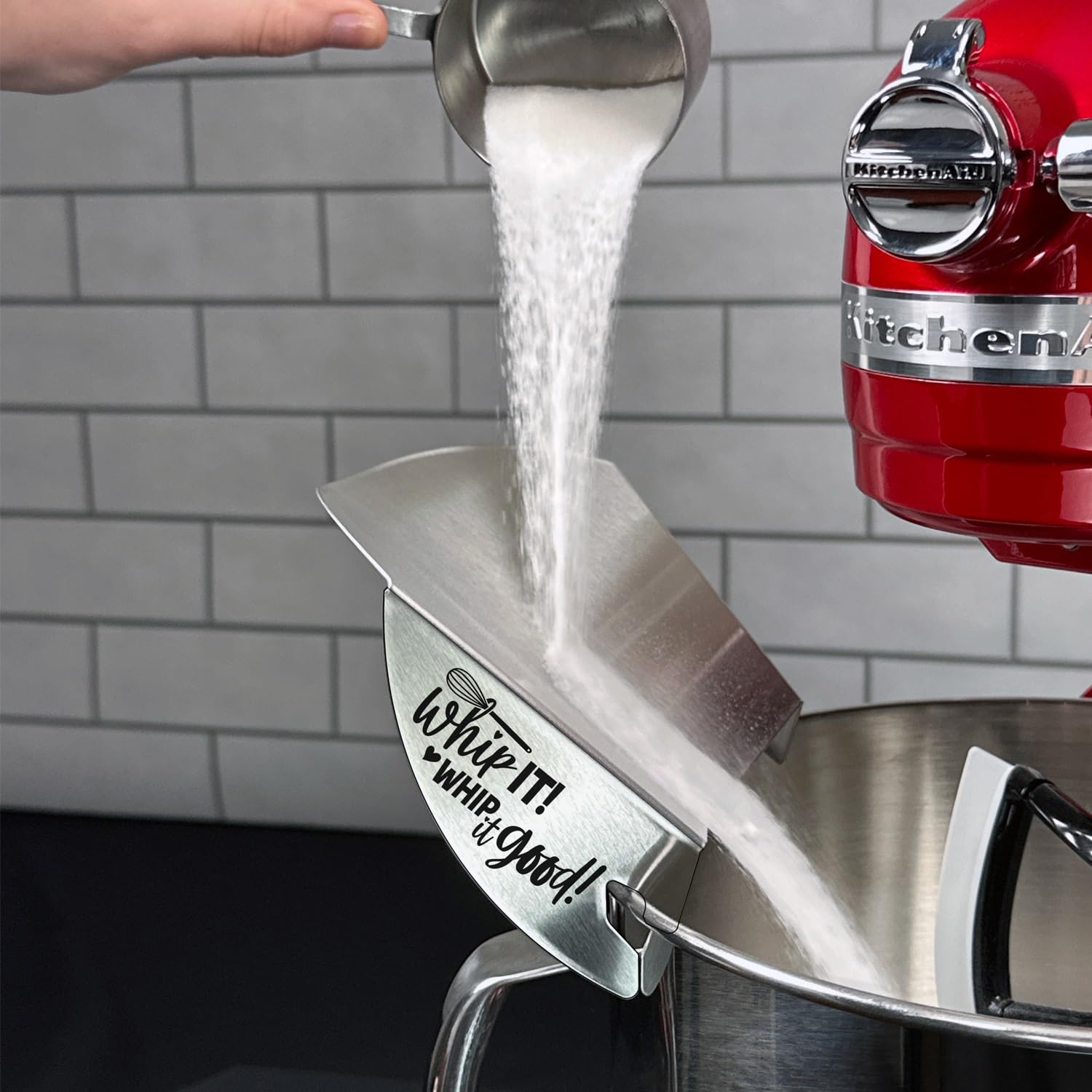 New Metro Design pouring chute in use on stand mixer reducing splatter and protecting hands
