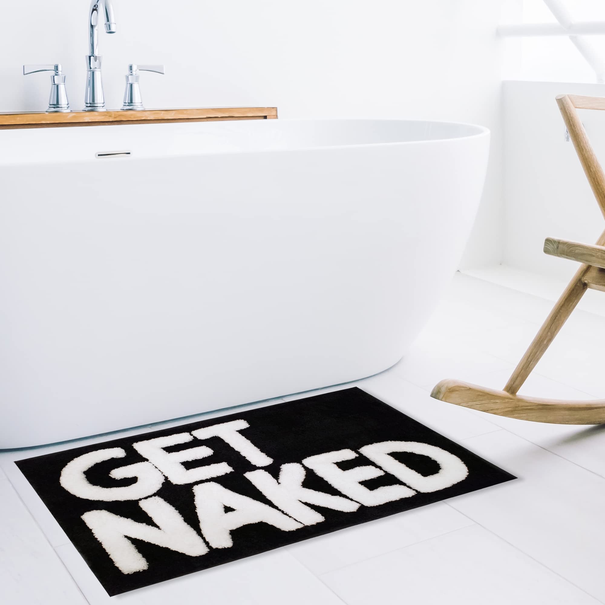 New Mungo styled bathroom setting with mat adding visual interest and cohesive decor benefit