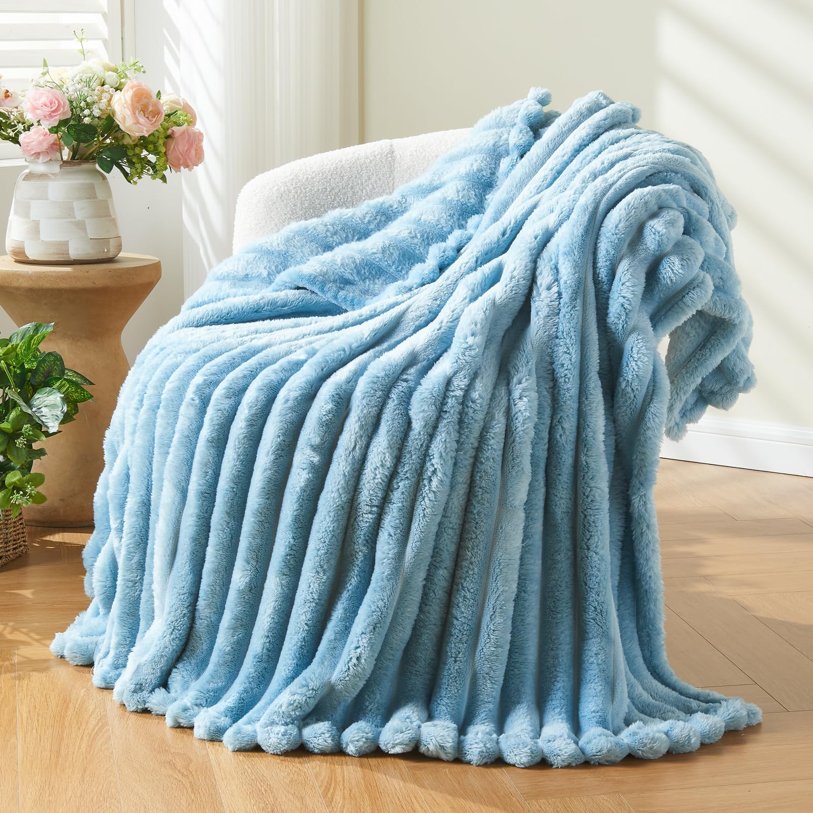 NEWCOSPLAY front-folded blanket showing plush blue fabric and generous coverage