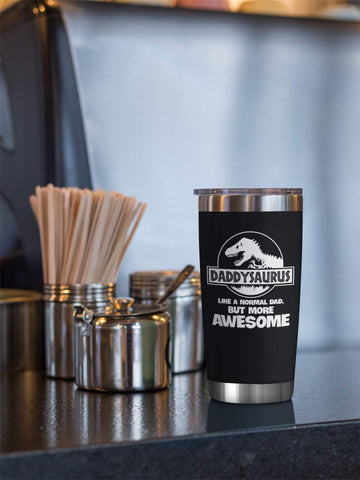 NewEleven tumbler in hand showing 20 oz size and portability benefit