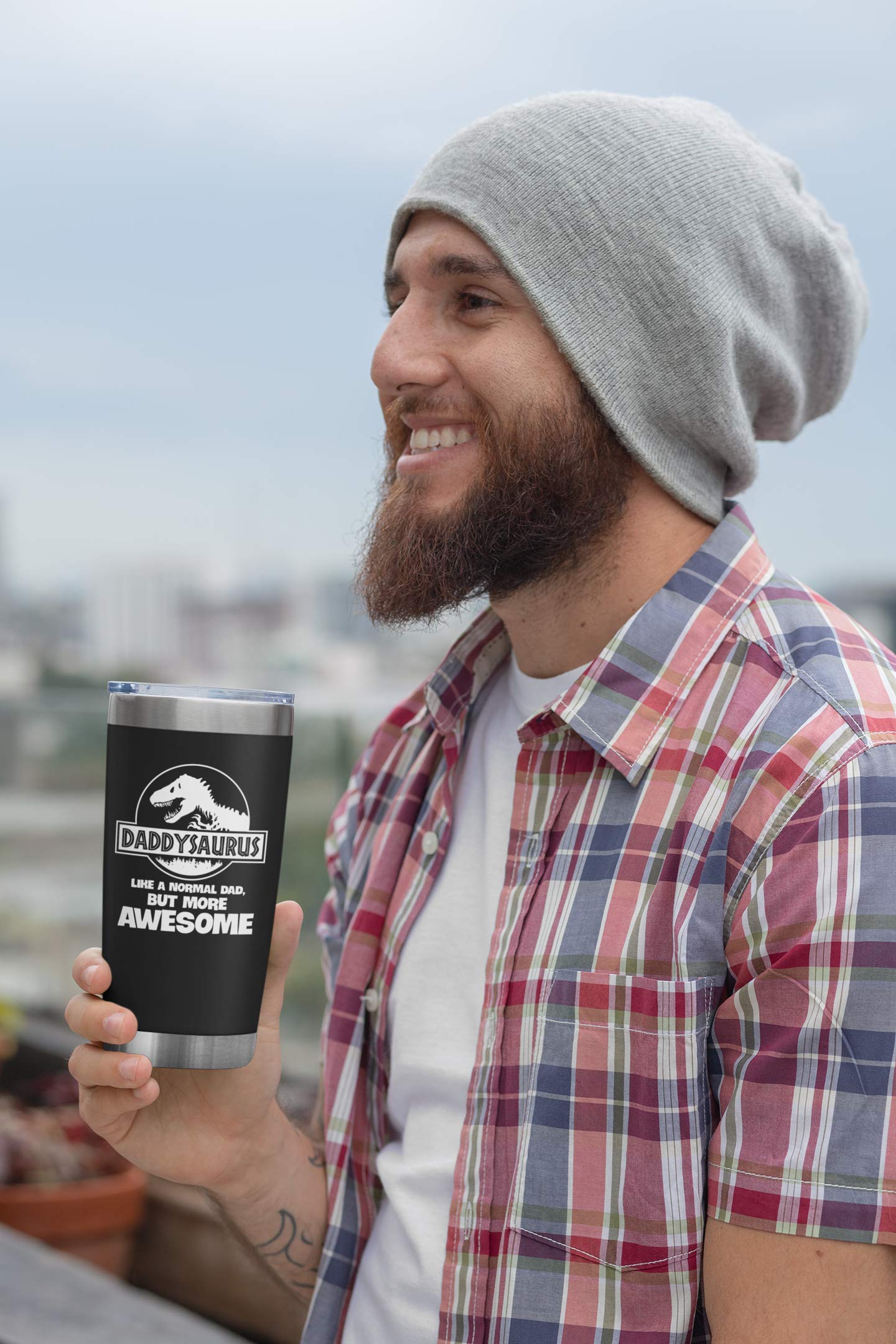 NewEleven tumbler in car cupholder showing travel-ready stability