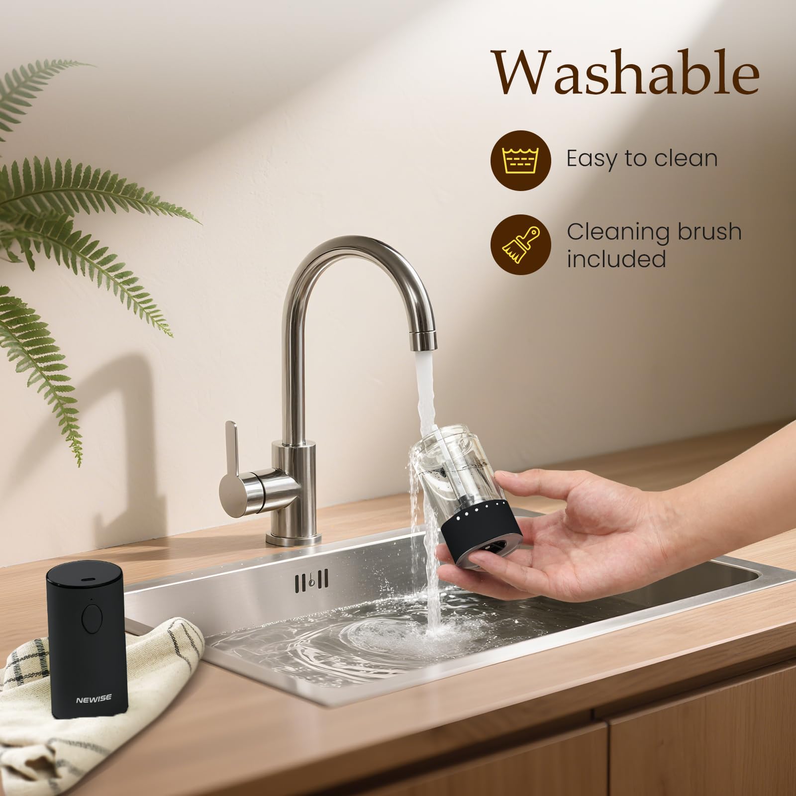 Newise beside a spoon for scale to show compact countertop fit