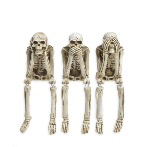 Newman House Studio front view of three no-evil skeletons for instant focal point