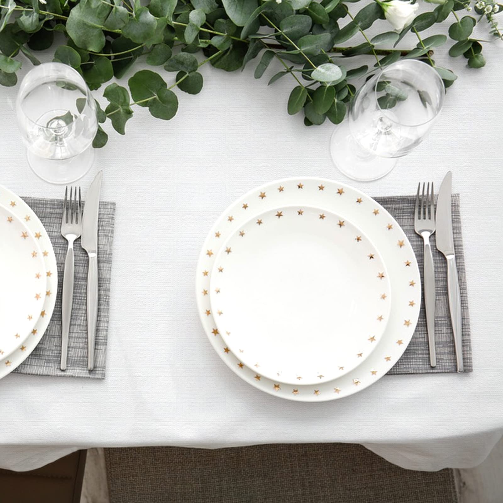 NEWOOK tablecloth next to chair showing scale and generous coverage