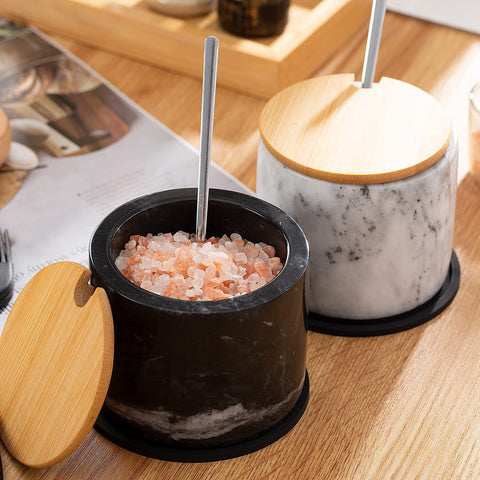 NHKRTE marble cellars styled on a dining table adding elegant finishing touch