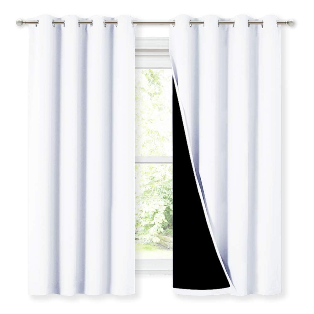 NICETOWN front view of white blackout curtains shows full coverage and elegant drape