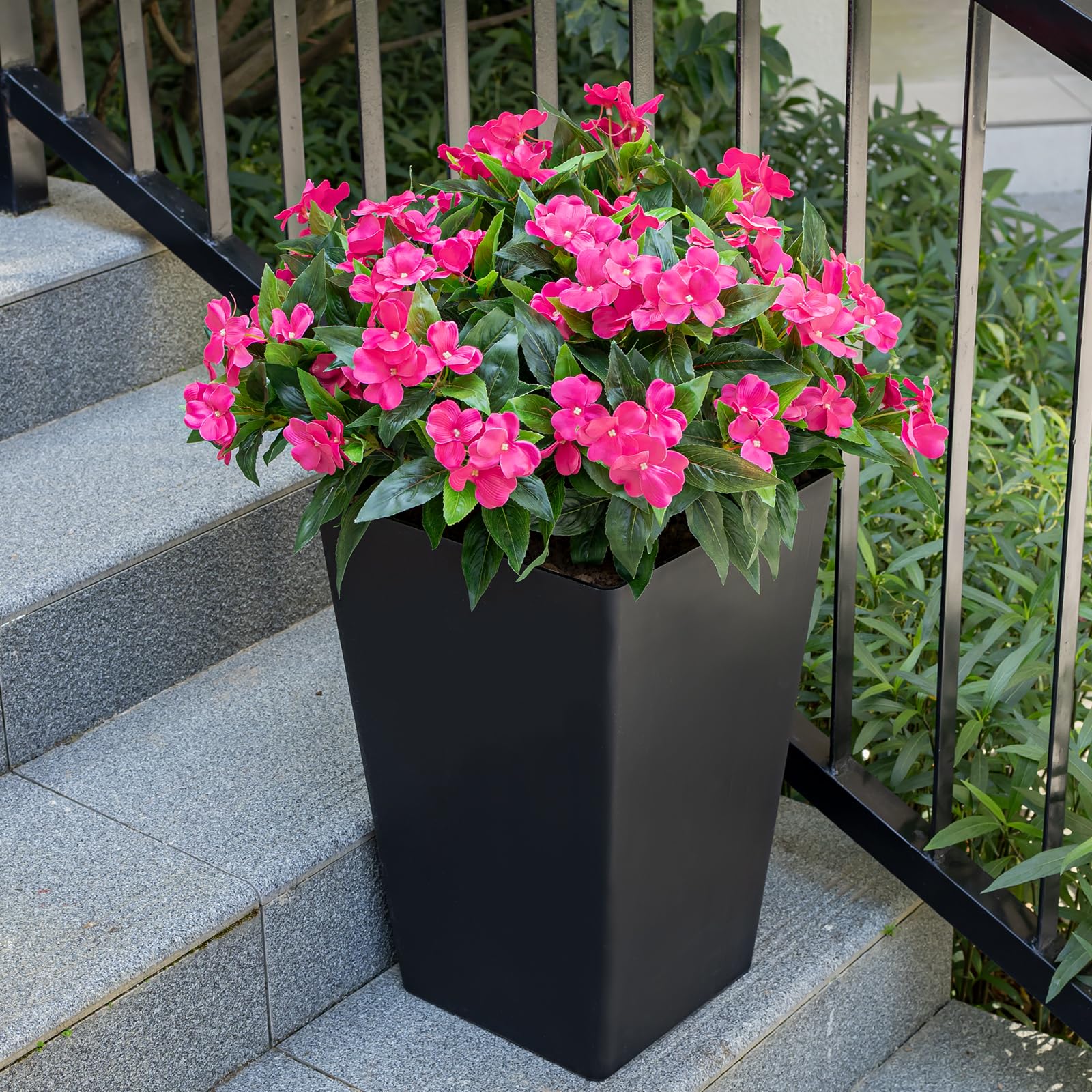 Nigirior mixed planter scene with faux Impatiens boosting low-maintenance garden style