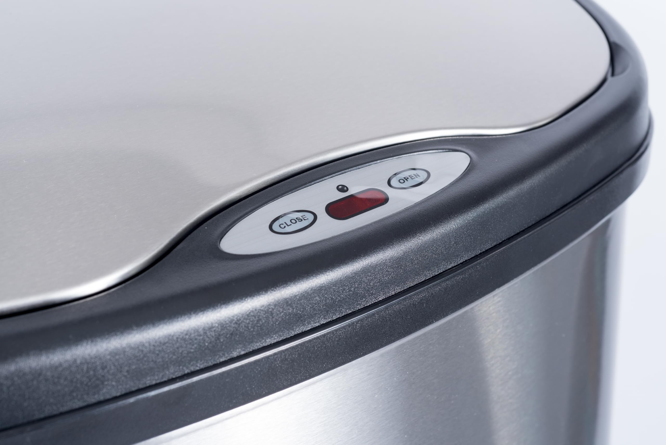 Ninestars cans next to kitchen cabinets showing scale and space-saving footprint