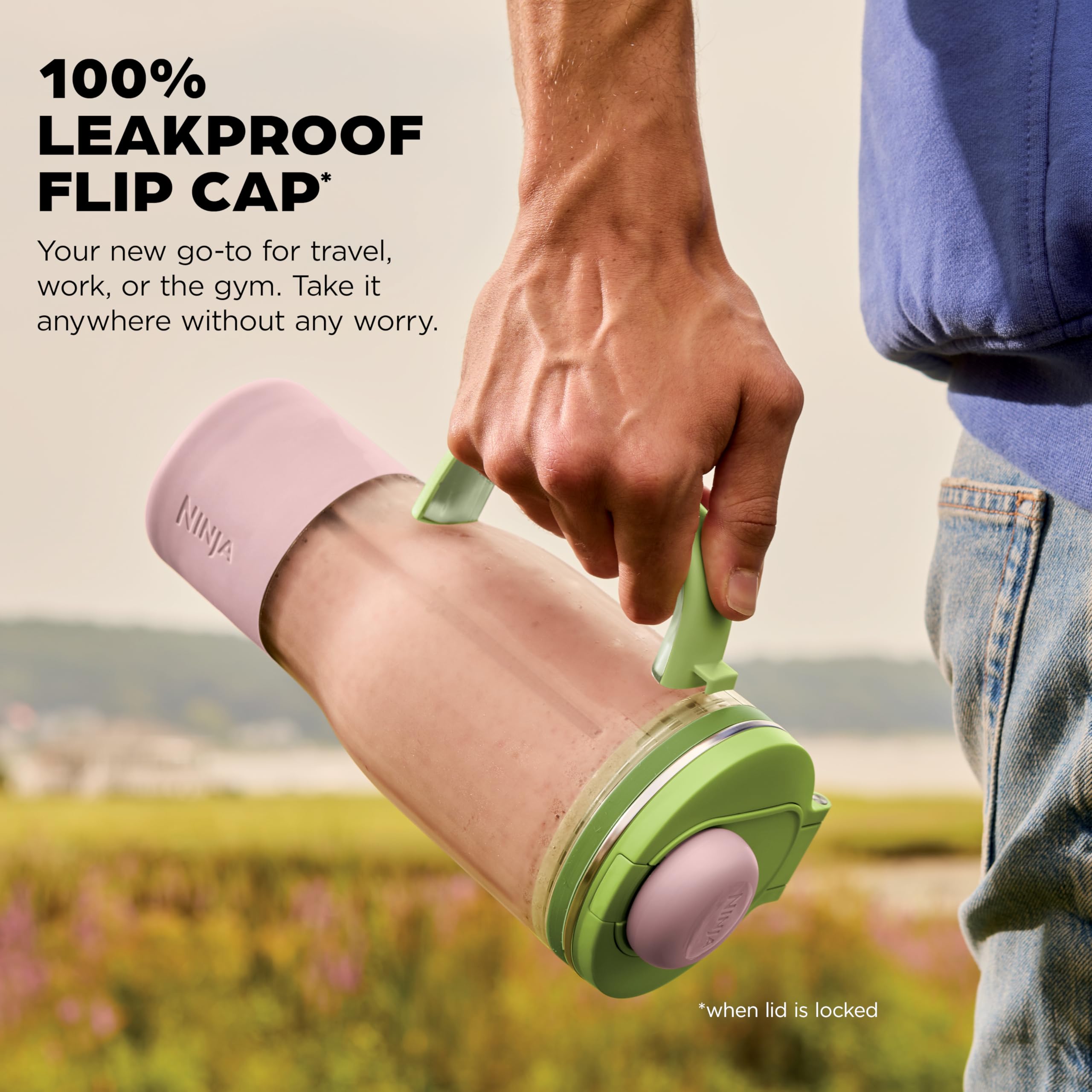Ninja BlendBOSS tumbler attached to BlendBOSS base blending a green smoothie