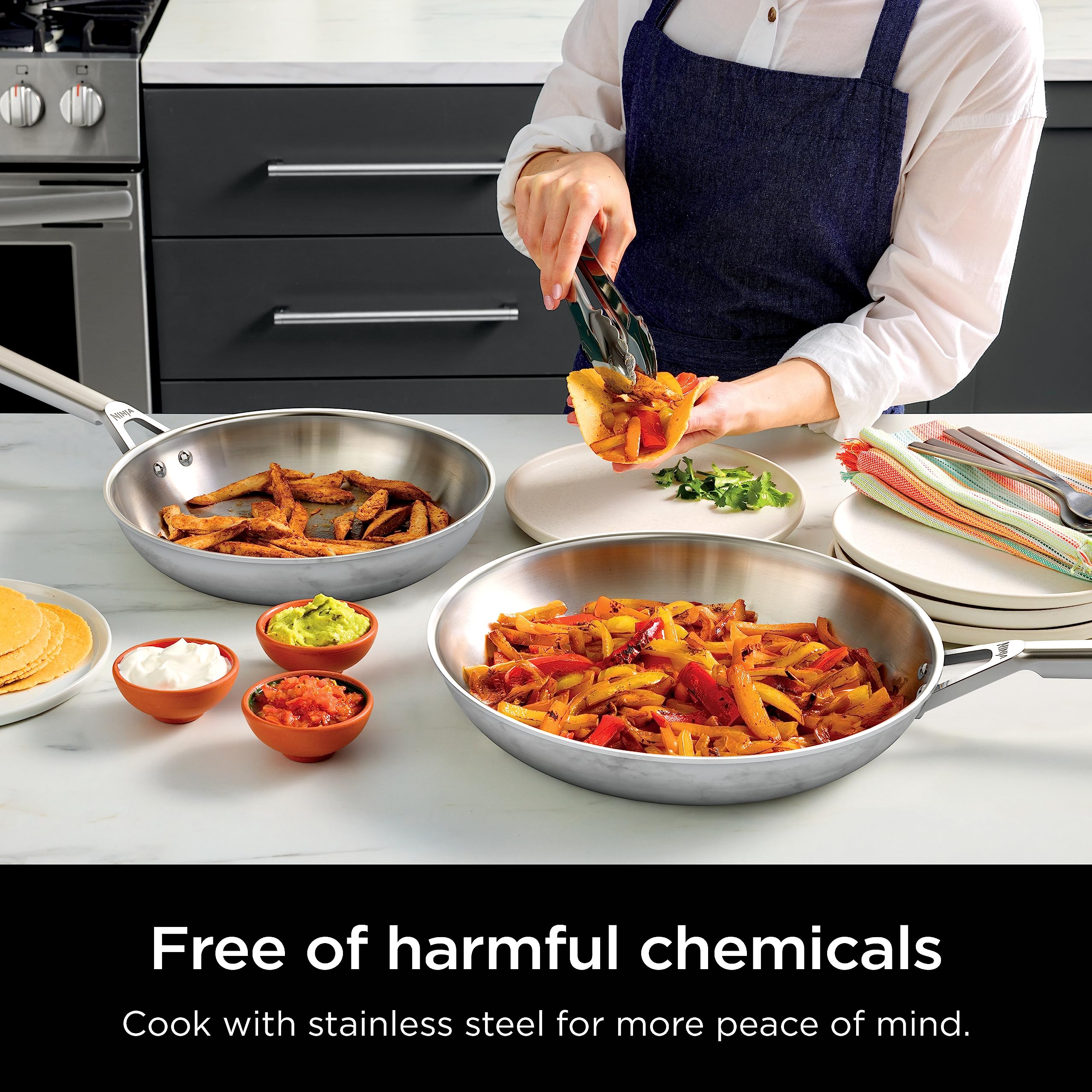 Ninja EverClad lid and handle detail highlighting secure grip and oven safety