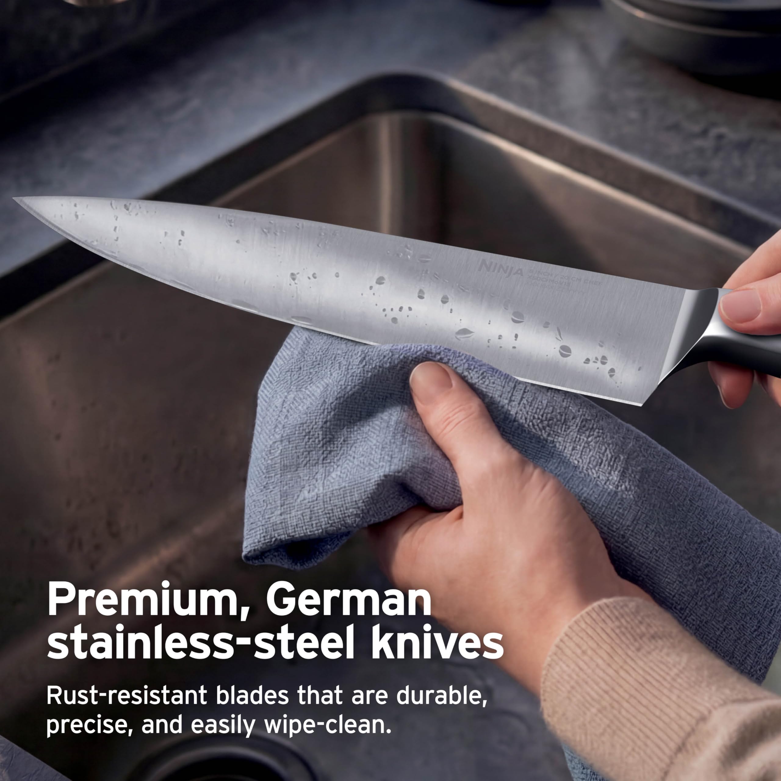 Ninja four steak knives slicing cooked meat for smooth, even cuts