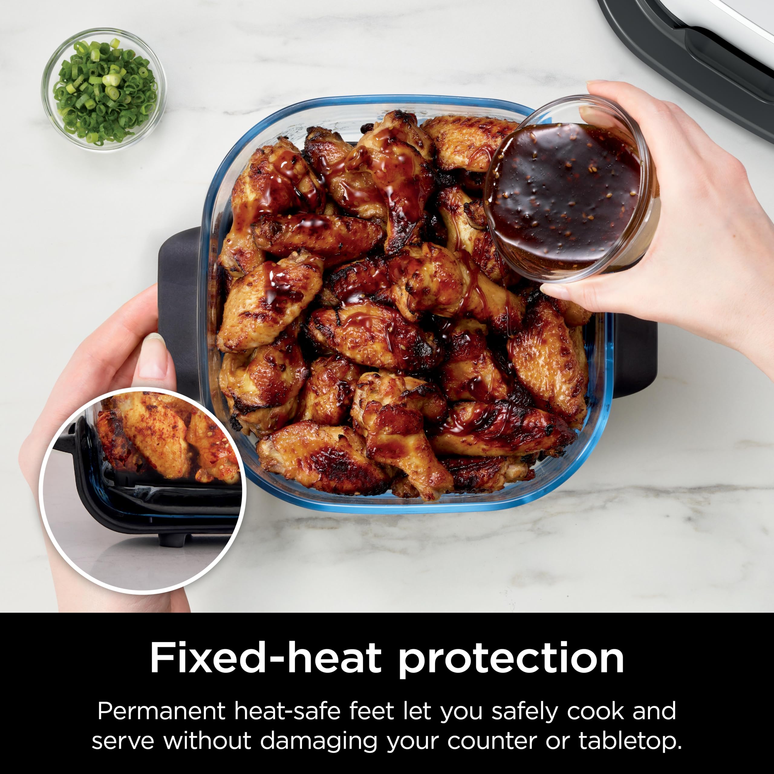 Ninja container next to hand showing 2.5QT size and portion clarity