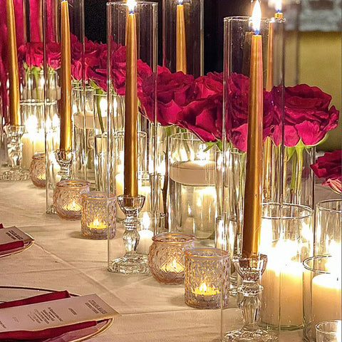 NITIME gold holders arranged as a wedding centerpiece creating romantic glow
