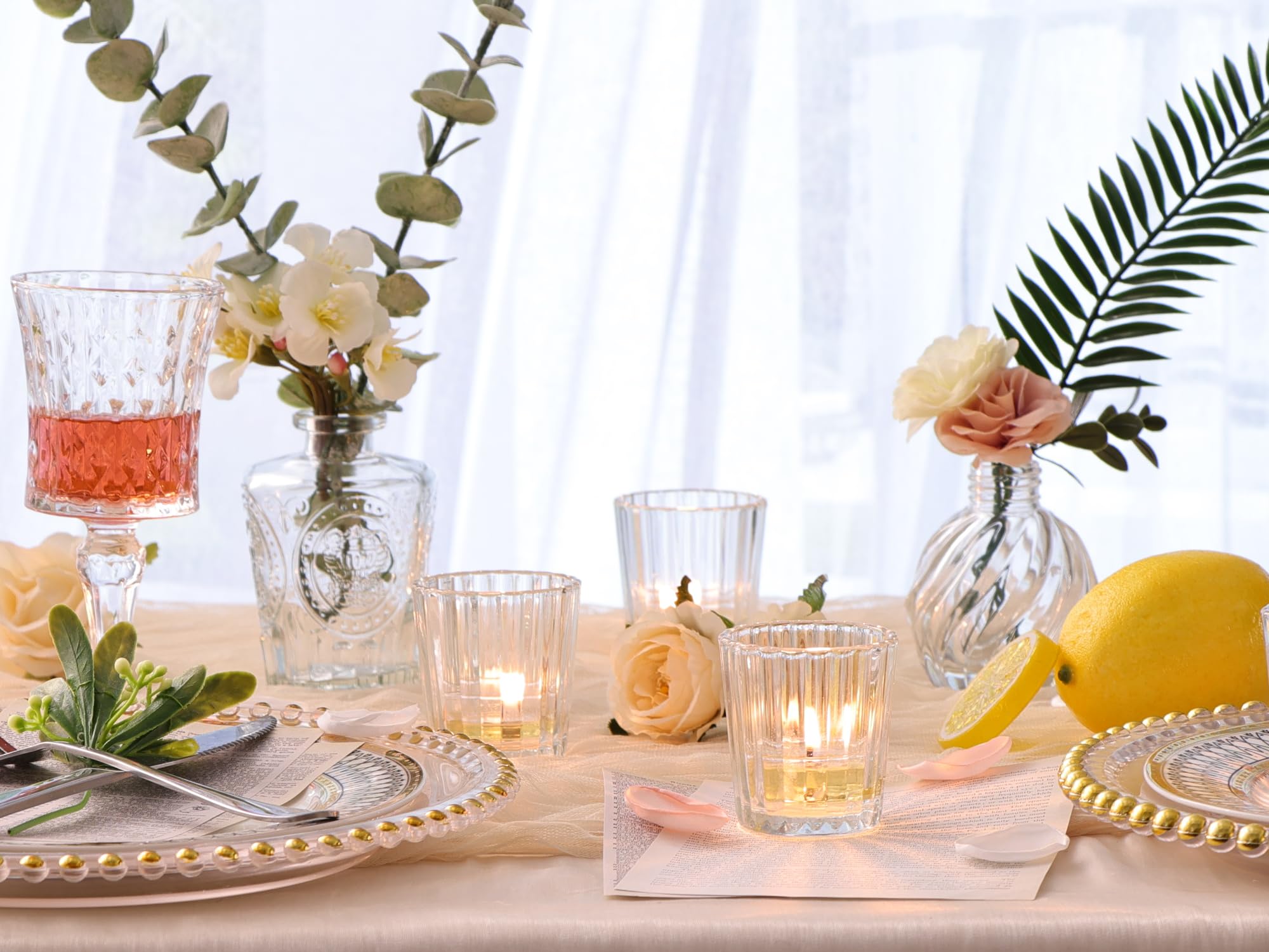 NITIME votive holder with lit tealight demonstrating warm glow and ambiance