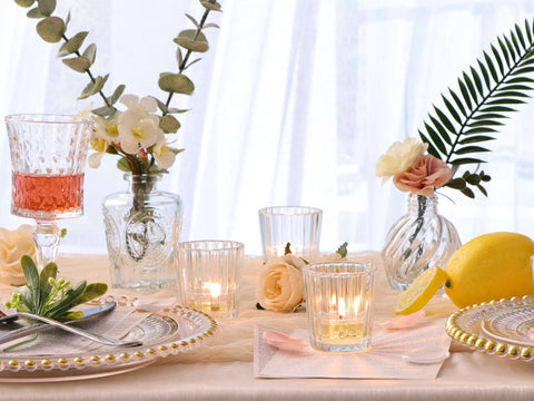 NITIME votive holder with lit tealight demonstrating warm glow and ambiance