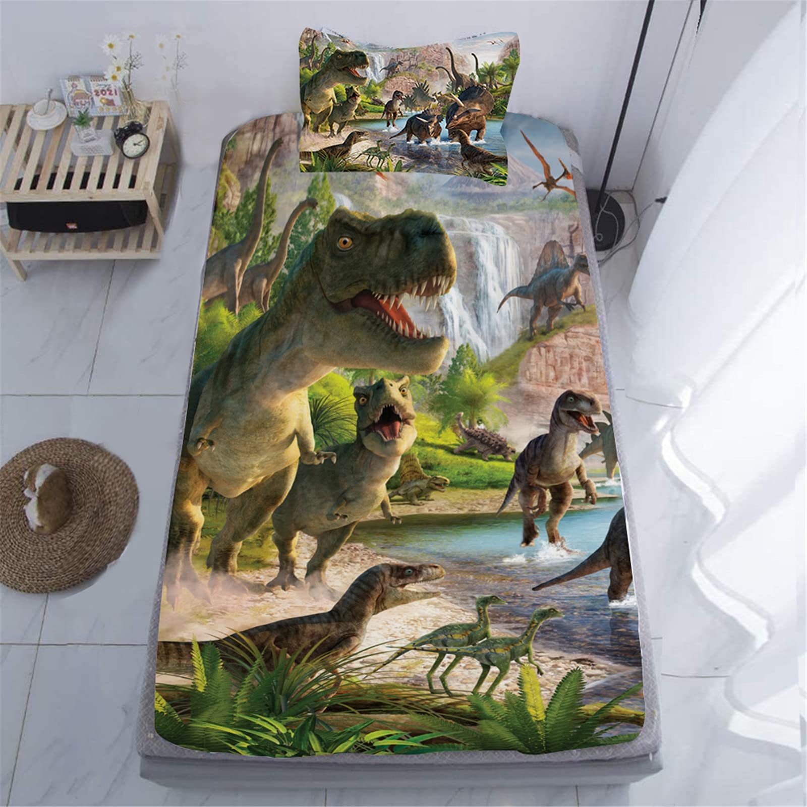 NiuOne front view of dinosaur fitted sheet packaging showing vibrant print and set contents