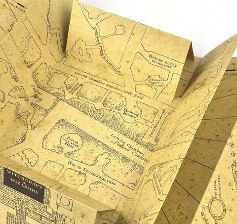 The Noble Collection Marauder's Map used in cosplay showing realistic prop enhancement