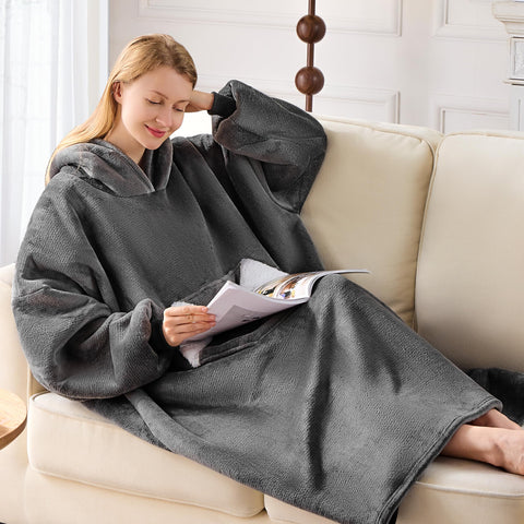 Nobleer lifestyle image on couch conveying relaxed warmth and cozy lounging