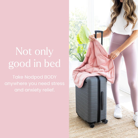 nodpod body beside a chair for scale showing compact size and easy storage benefit