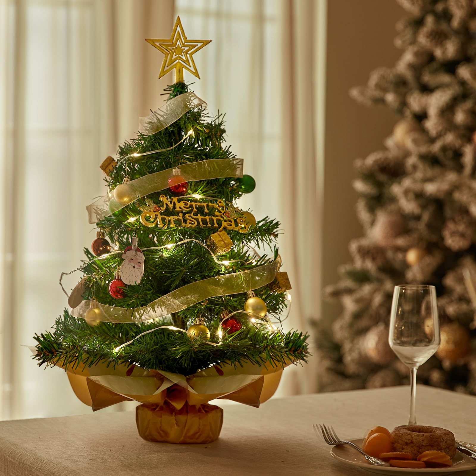 Noiclub mini tree in dorm room lifestyle scene adding festive space-saving cheer