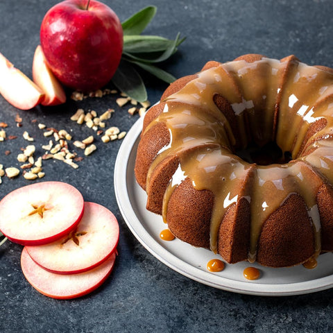 Nordic Ware unmolded Bundt cake with glaze showing pan creates clean decorative edges benefit