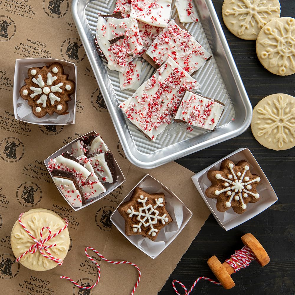 Nordic Ware baked cookies with clear snowflake impressions showcasing visual appeal