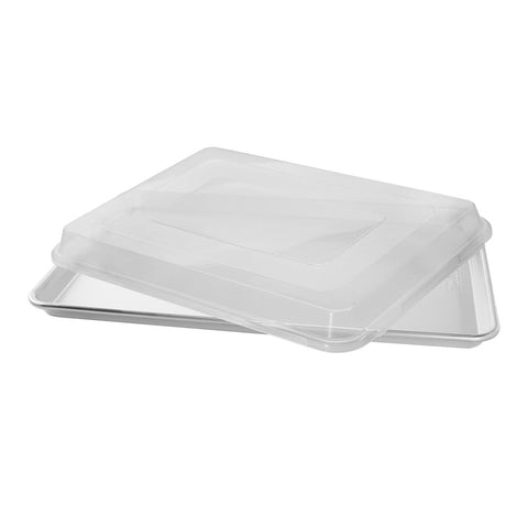 Nordic Ware pan with lid on for transport highlighting easy, spill-safe carrying