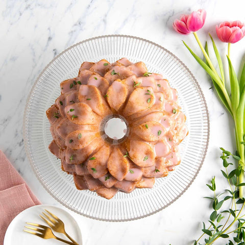 Nordic Ware baked cake removed from pan with defined petals for impressive presentation