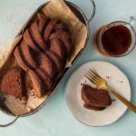 Nordic Ware braided loaf pan inside oven demonstrating even browning benefit
