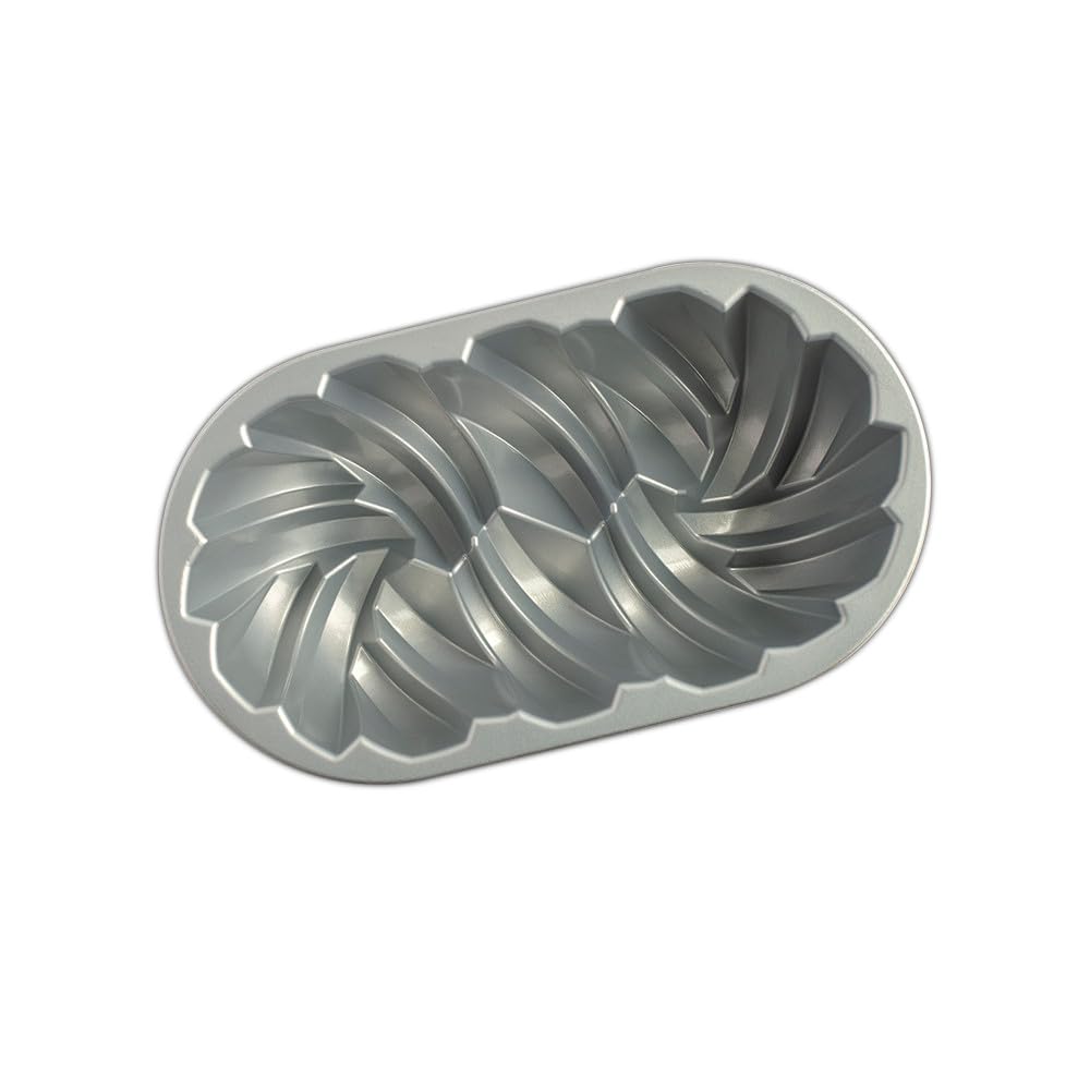 Nordic Ware loaf pan with baked loaf removed illustrating effortless release benefit