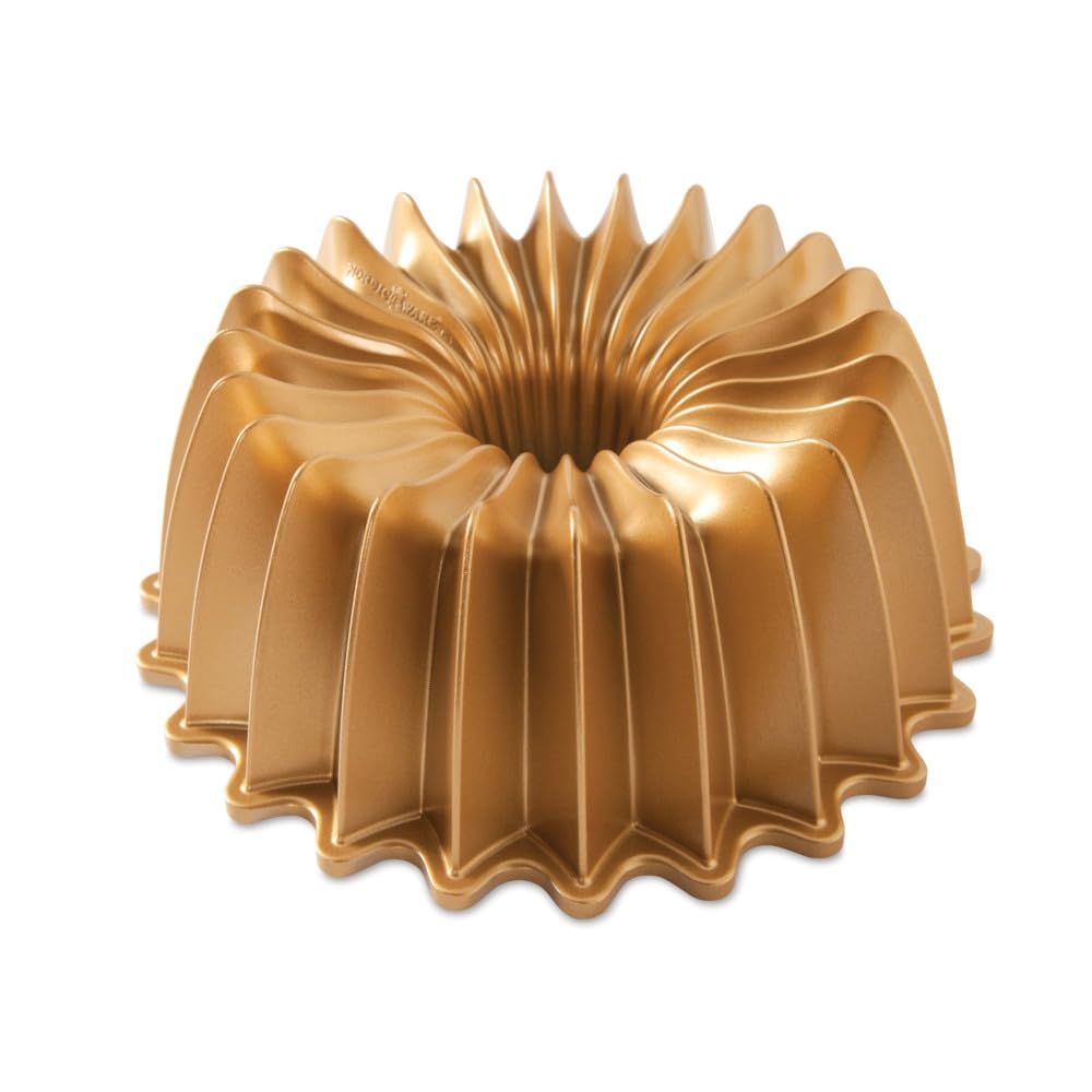 Nordic Ware Brilliance Bundt front view showing gold finish and elegant shape for polished presentation