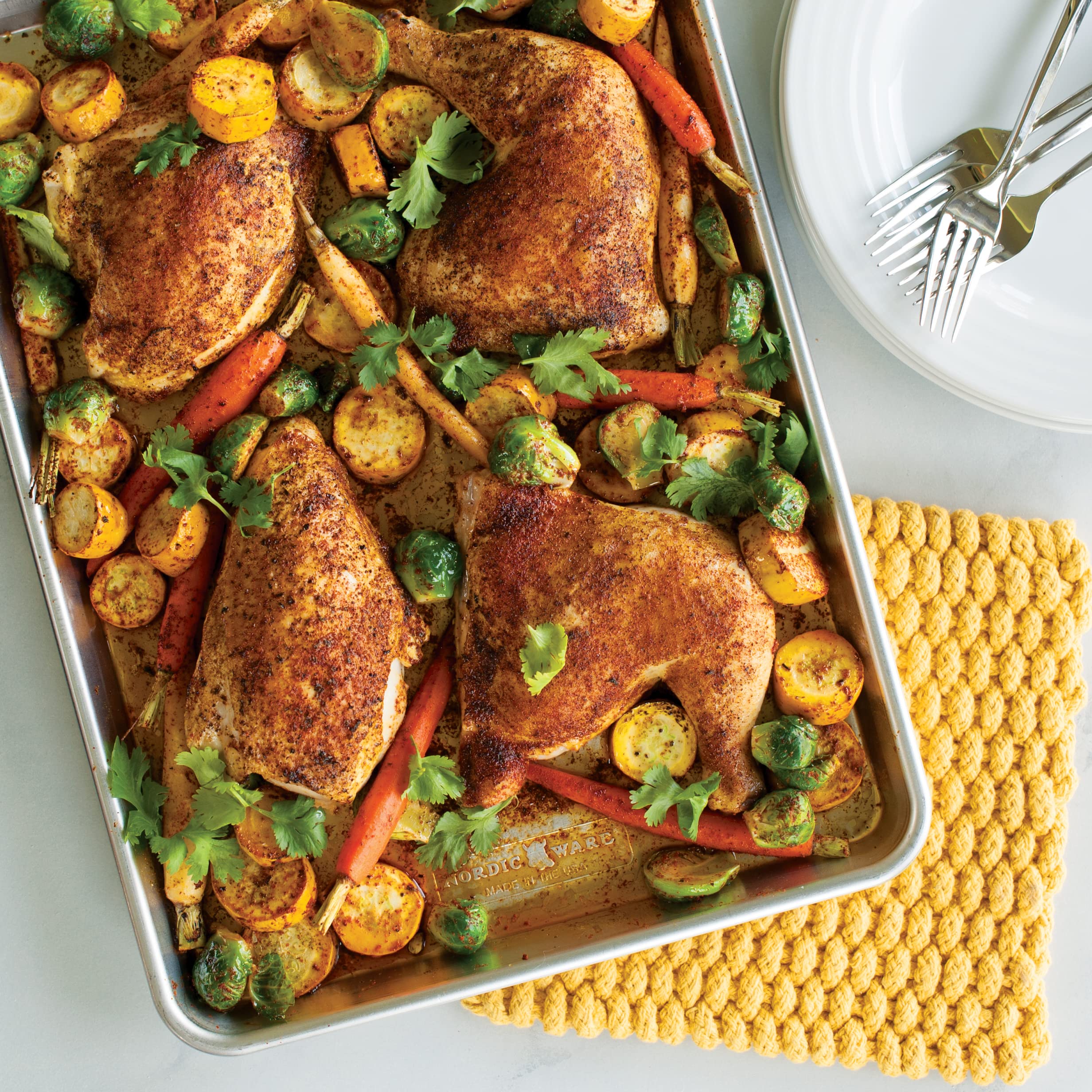 Nordic Ware pan under broiler demonstrating broiler-safe uncoated aluminum performance