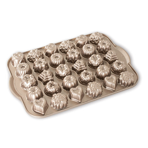 Nordic Ware front view of 30-cavity Bundt tea cake mold showing variety and durability