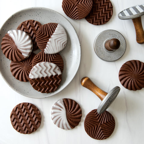 Nordic Ware finished cookies arranged to show embossed geometric decoration