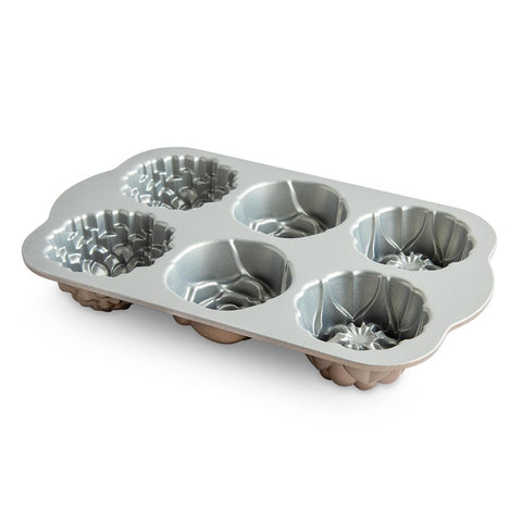 Nordic Ware plated cakelets in kitchen setting showing presentation-ready results and serving convenience benefit