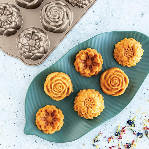 Nordic Ware top close-up of pan cavities highlighting crisp floral detail and release benefit
