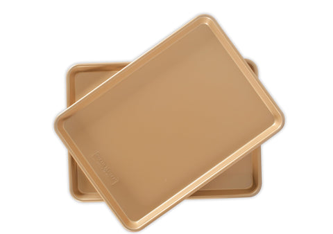 Nordic Ware front view of two half-sheet pans showing packaging and size, durable baking solution