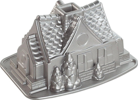 Nordic Ware front view showing house cake details and festive benefit