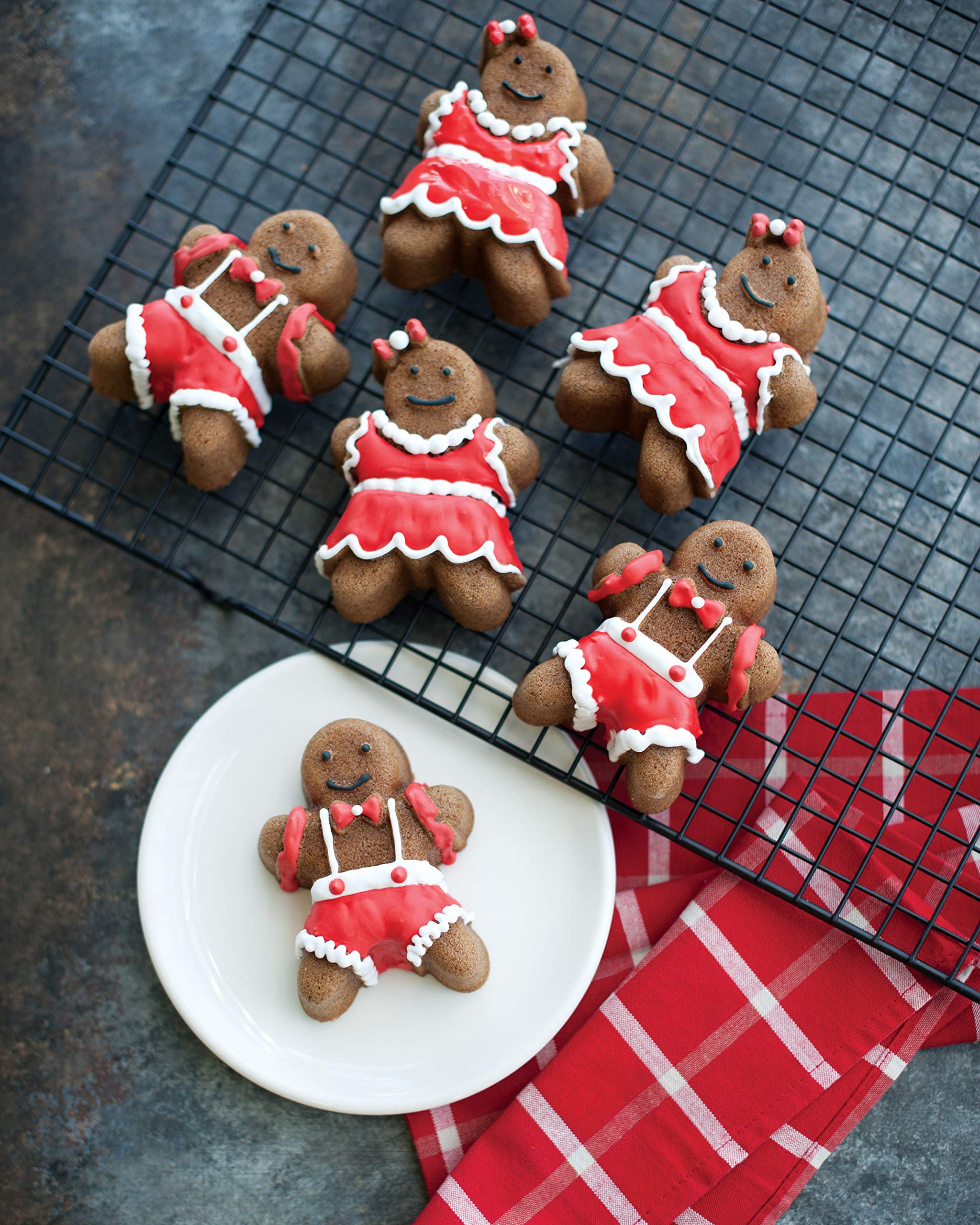 Nordic Ware cakelets being decorated with icing for fun family activity