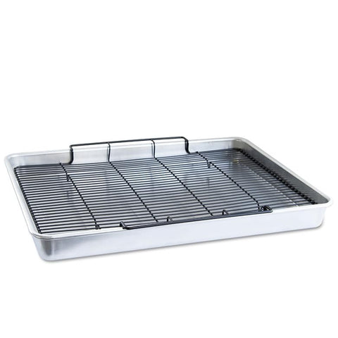 Nordic Ware tray in oven with fries and bacon for crisp results