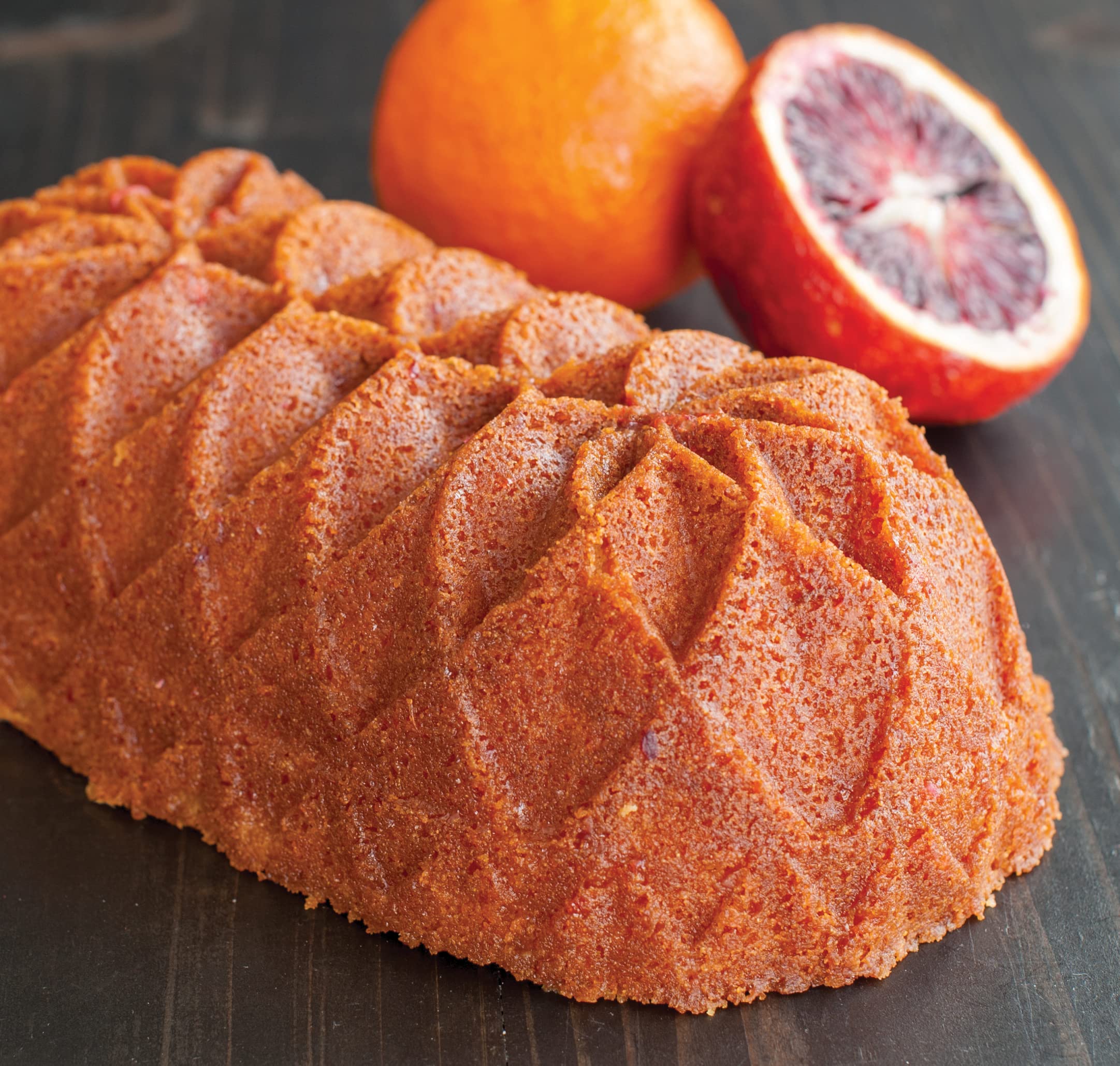 Nordic Ware pan with baked loaf demonstrating even browning and clean release